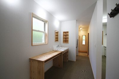 洗面室→トイレは、ドアを設けずオープンな空間に仕上げました