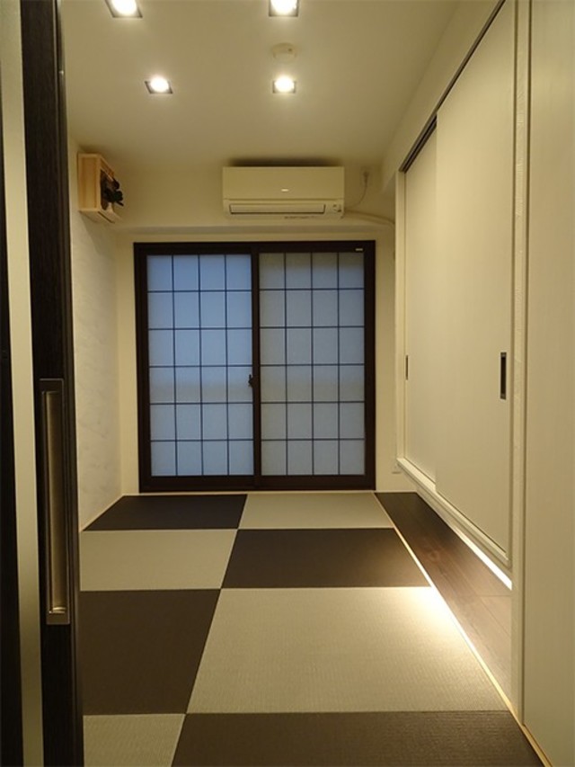 着物が趣味の奥様。市松模様の畳がおしゃれなモダン和室に。
来客時にはゲストルームへ。